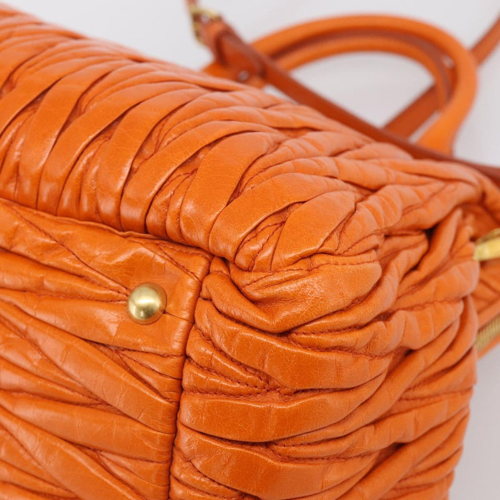 Miu Miu Matelasse Hand Bag Leather 2way Orange Gold Auth 167896A
