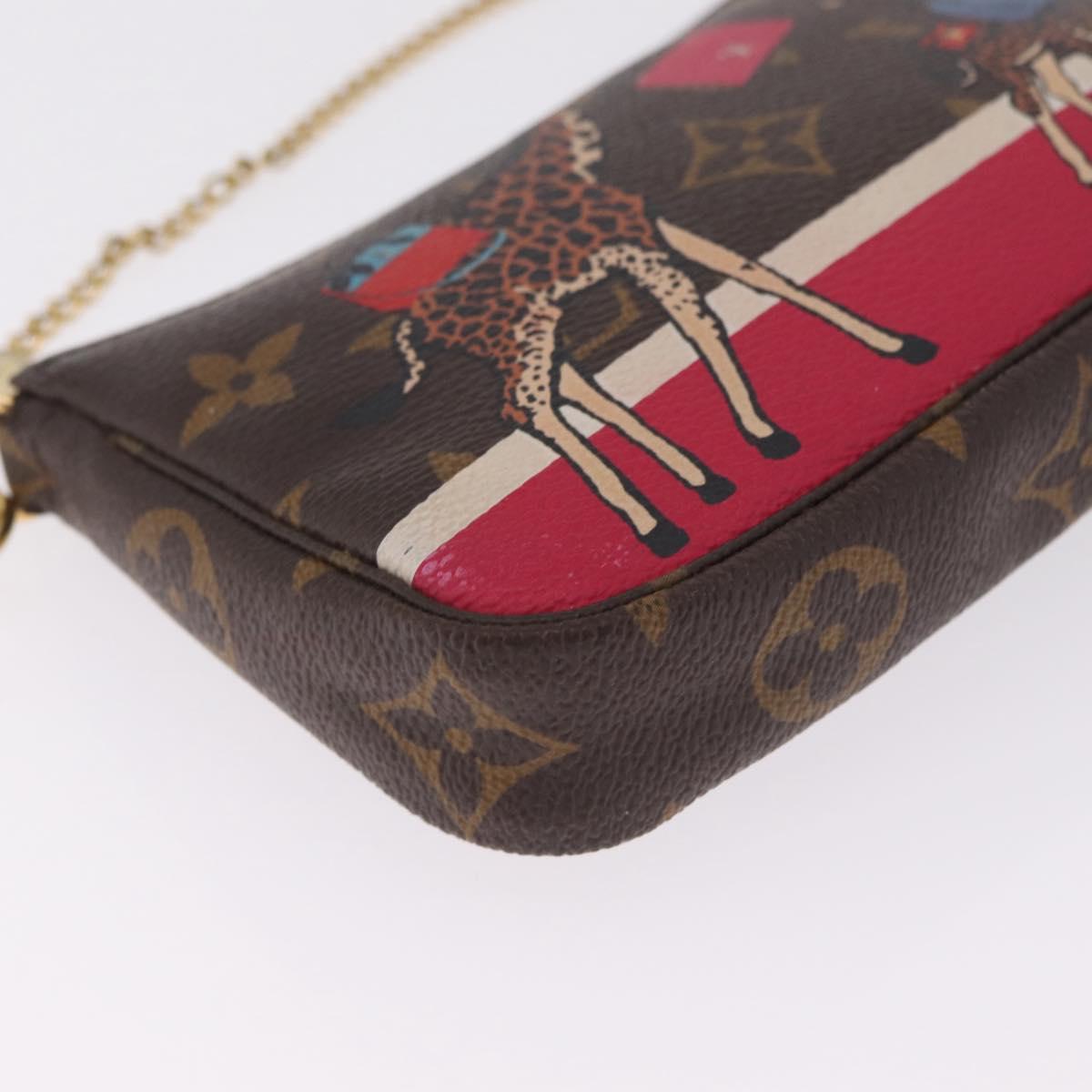 LOUIS VUITTON Monogram Giraffe Mini Pochette Accessoires M62087 Auth 210836SAM