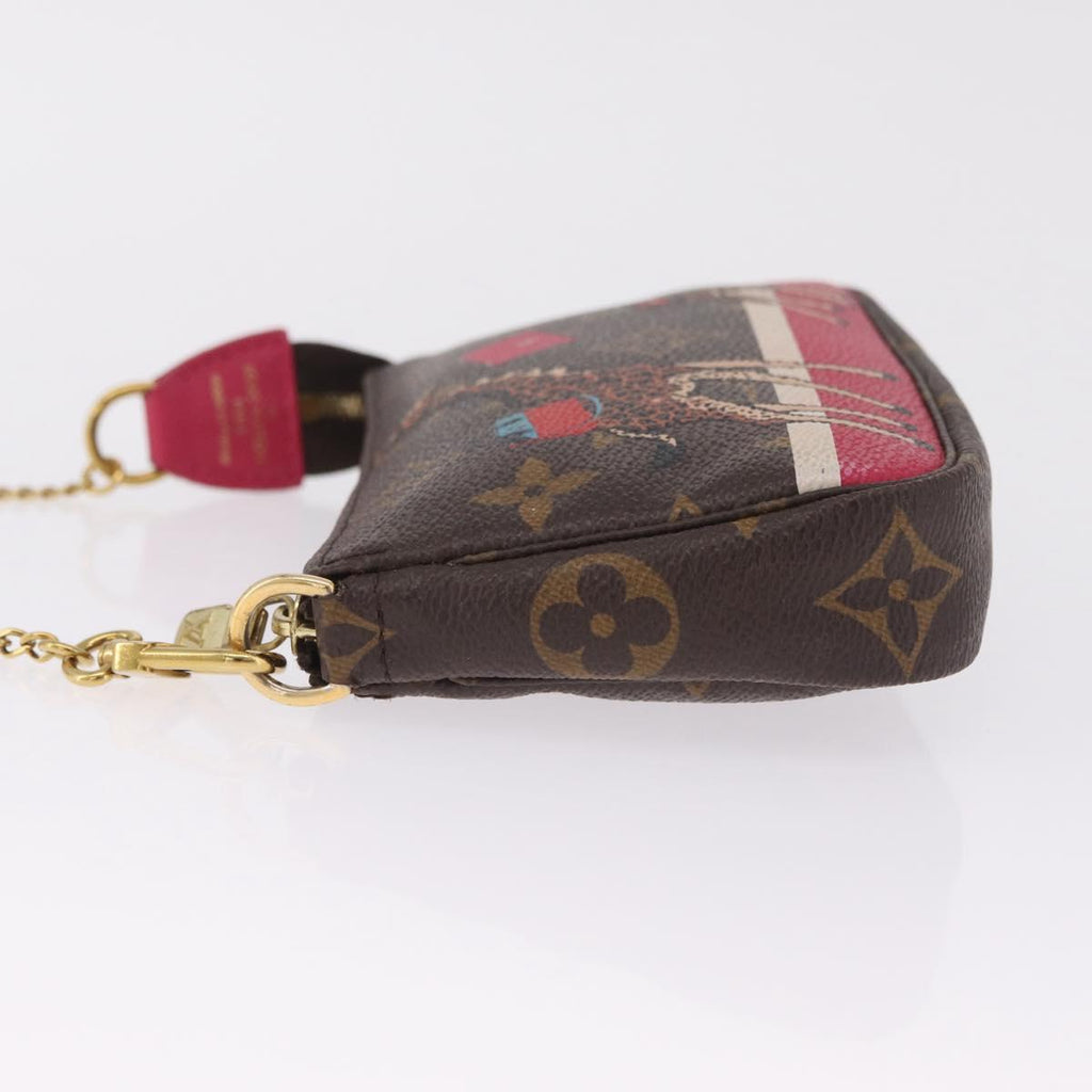 LOUIS VUITTON Monogram Giraffe Mini Pochette Accessoires M62087 Auth 210836SAM